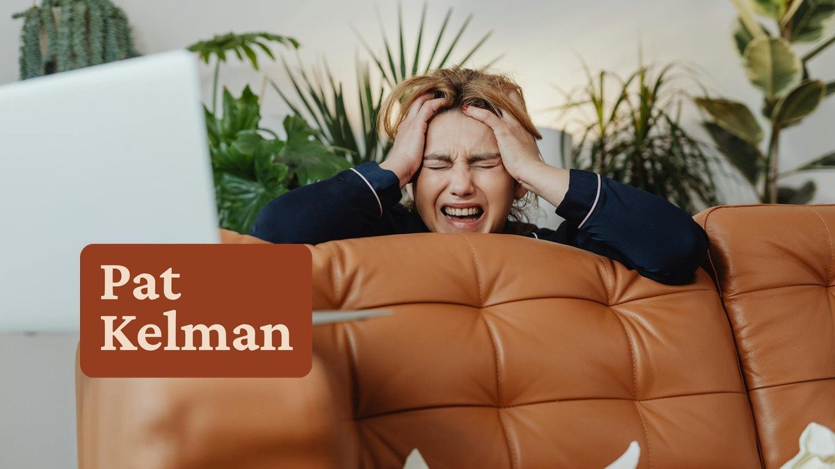 Frustrated woman on sofa — coaching content not working