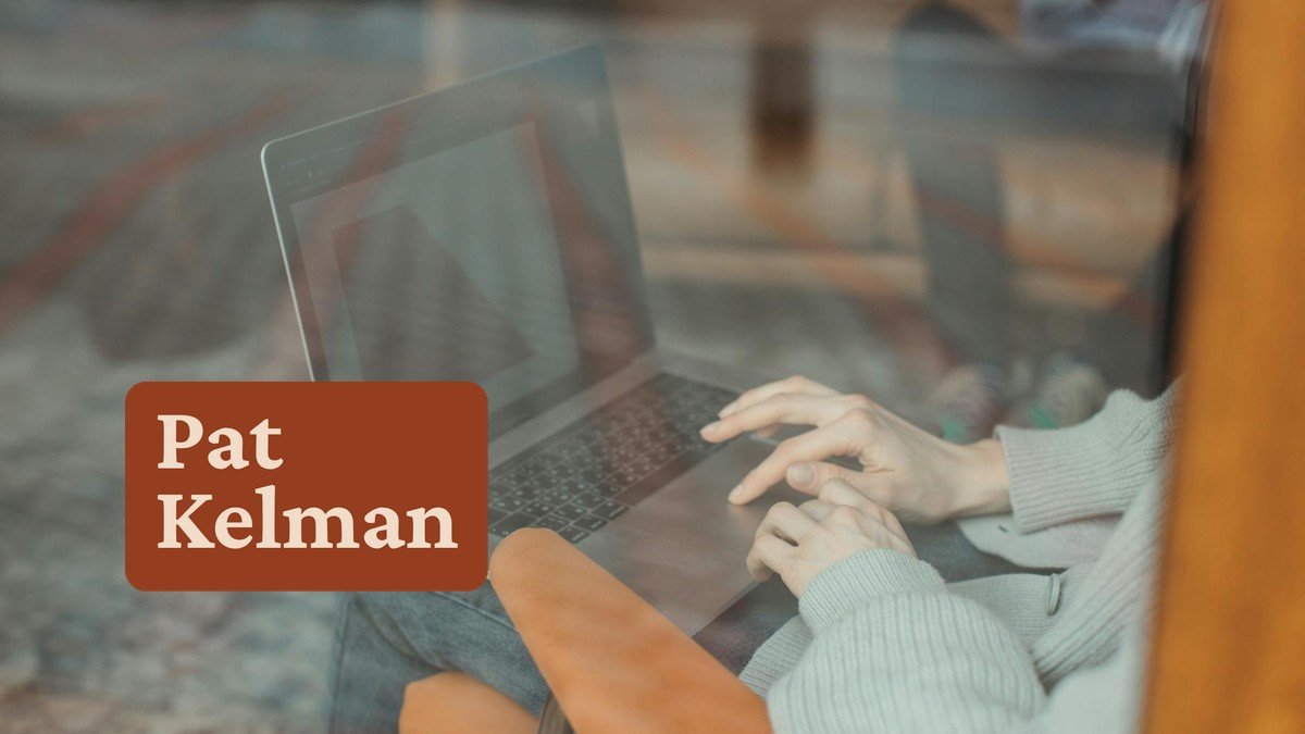 Person using laptop with warm screen glow — AI audience research