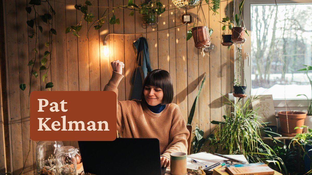 Woman working at laptop with determination — AI content strategy for coaches